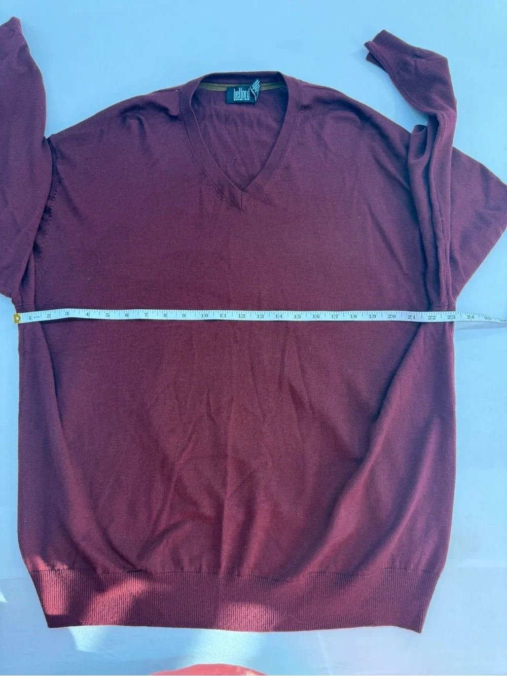 Men's V-Neck Sweater in Burgundy by Belford. Made of extra fine Merino Wool.